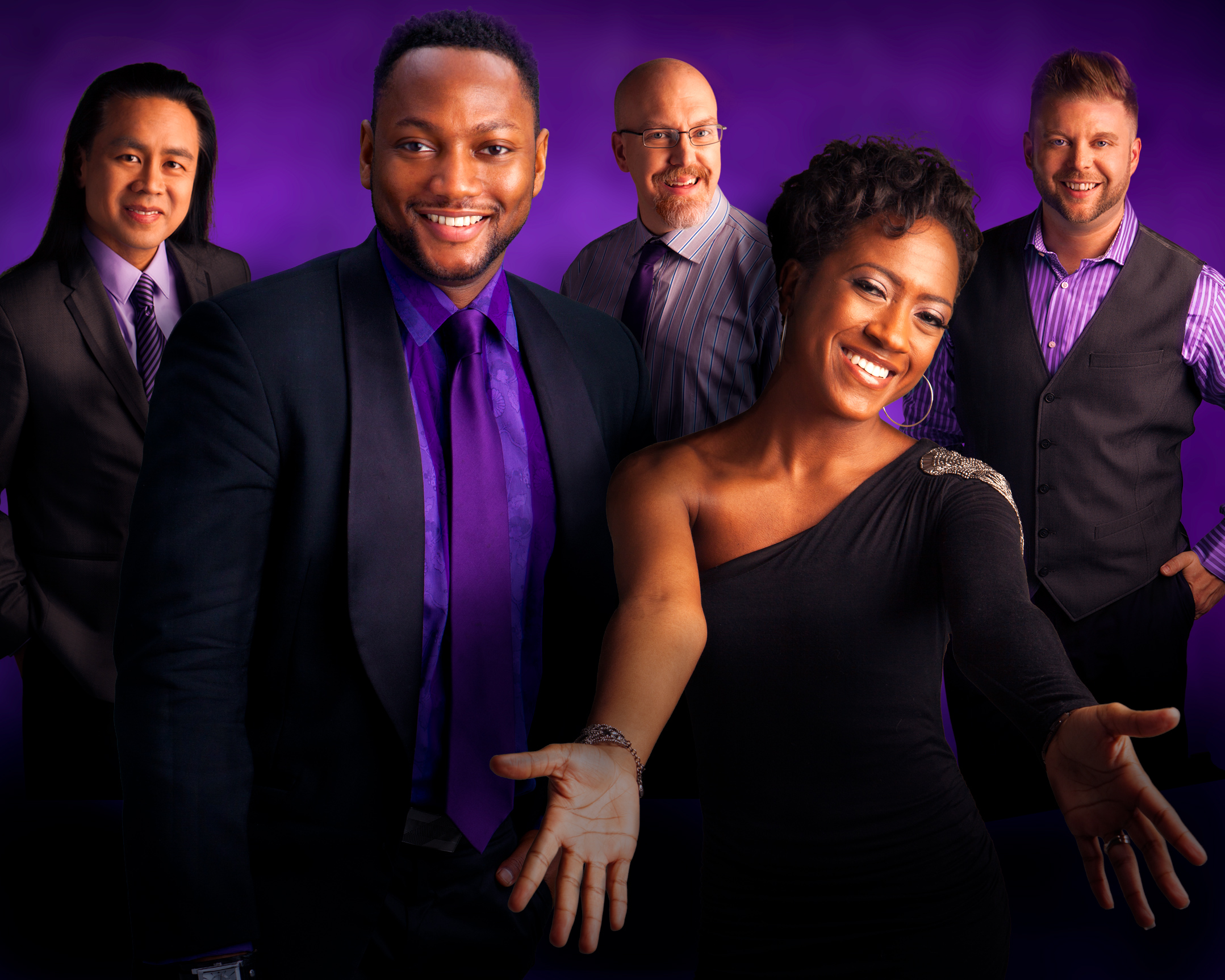 All 5 members of Spoken Four are dressed in purple and standing in front of a purple background.