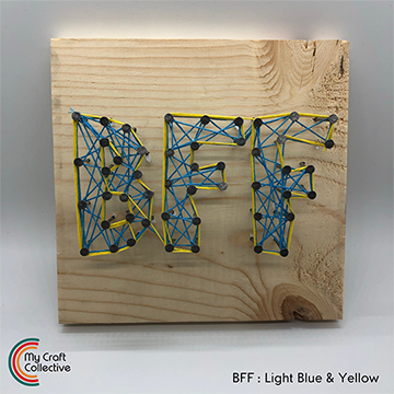 BFF string art made with yellow and blue string.