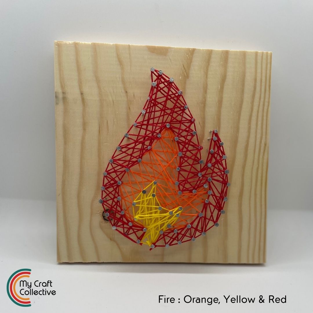 Flame string art made with red, orange, and yellow string.