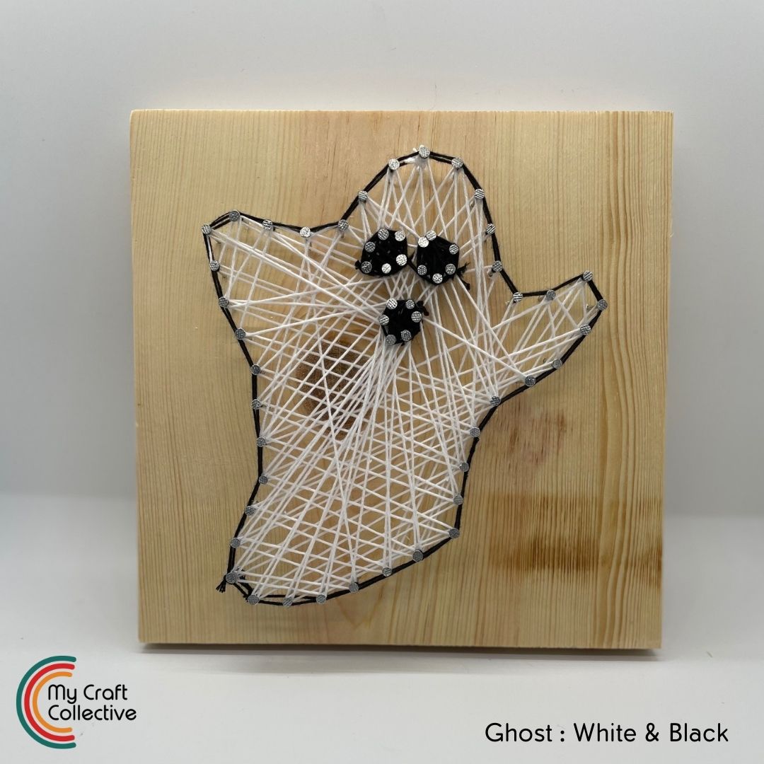 Ghost string art made with white and black string.